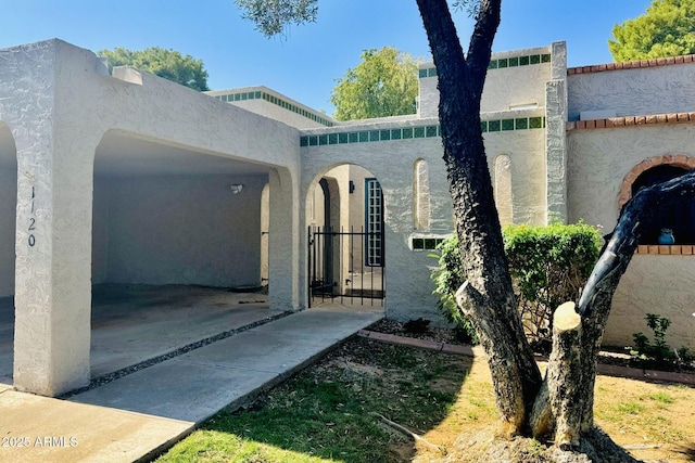 1120 E Beryl Ave, Phoenix, AZ 85020 - view of side of home with stucco siding
