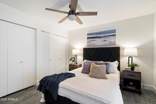 1120 E Beryl Ave, Phoenix, AZ 85020 - bedroom with multiple closets, wood finished floors, and a ceiling fan