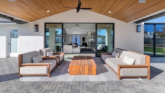 view of patio with ceiling fan and an outdoor hangout area