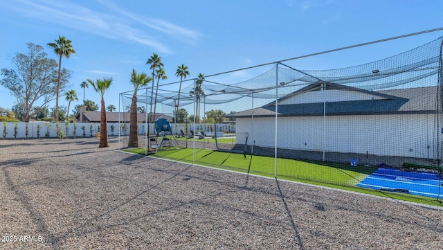 view of yard with tennis court