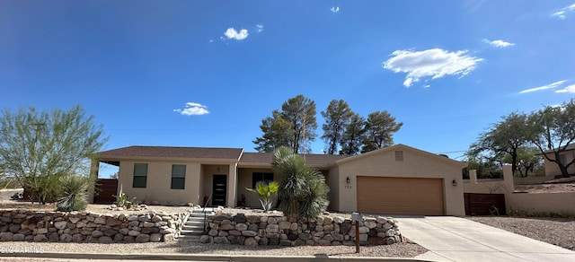 ranch-style home with a garage