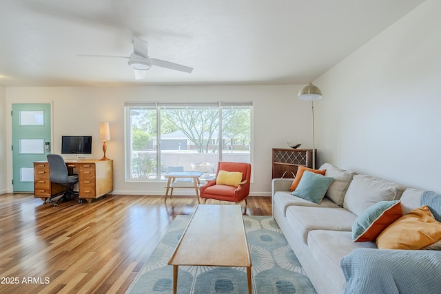 314 E Royal Palm Rd, Phoenix, AZ 85020 - living area with light wood-style flooring, a desk, and ceiling fan