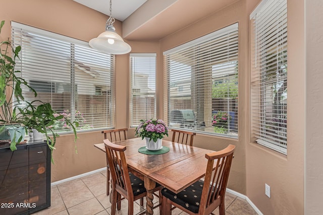 12417 W Apache St, Avondale, AZ 85323 - dining room featuring light tile patterned floors and baseboards