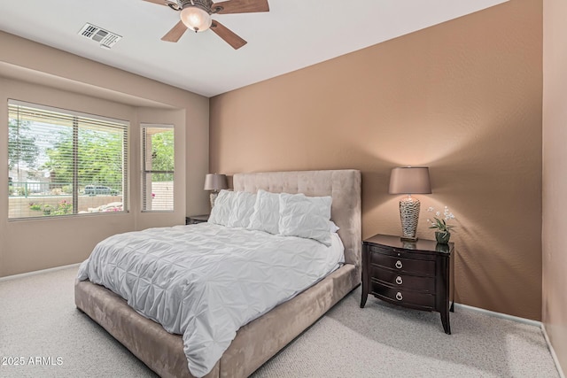 12417 W Apache St, Avondale, AZ 85323 - bedroom featuring carpet flooring, baseboards, and a ceiling fan