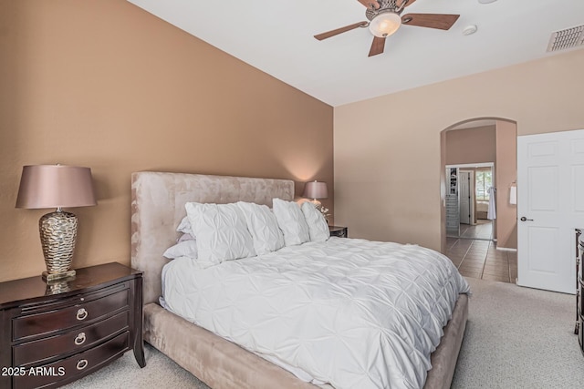 12417 W Apache St, Avondale, AZ 85323 - carpeted bedroom featuring arched walkways and a ceiling fan