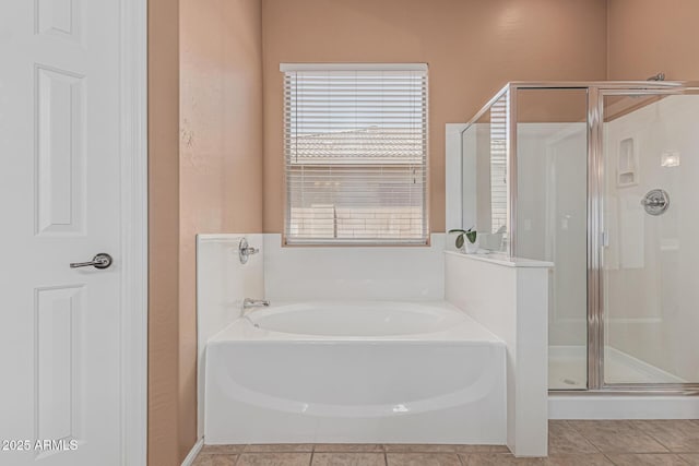 12417 W Apache St, Avondale, AZ 85323 - bathroom featuring a garden tub, a stall shower, and healthy amount of natural light
