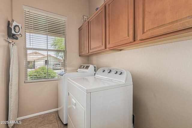12417 W Apache St, Avondale, AZ 85323 - washroom featuring cabinet space, washer and dryer, baseboards, and light tile patterned floors
