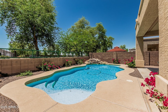 12417 W Apache St, Avondale, AZ 85323 - view of pool featuring a fenced backyard and a patio