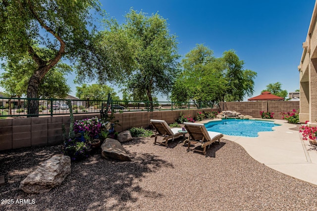 12417 W Apache St, Avondale, AZ 85323 - view of pool featuring a fenced backyard and a patio area