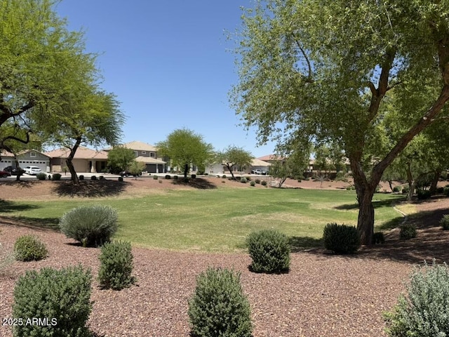 12417 W Apache St, Avondale, AZ 85323 - view of property's community with a yard