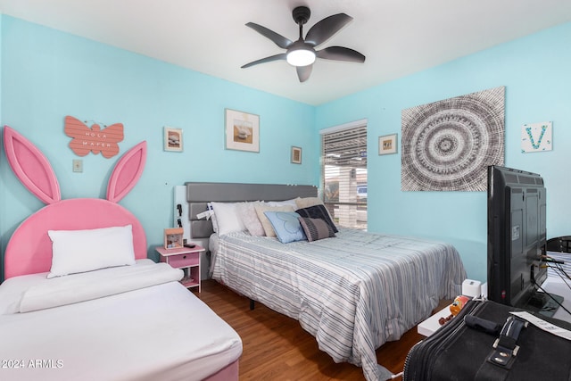 bedroom featuring ceiling fan and hardwood / wood-style floors