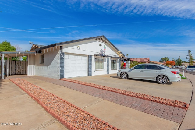 view of property exterior with a garage