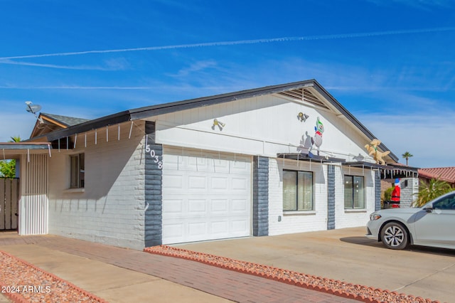 view of front of property featuring a garage