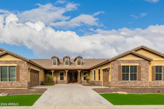 view of front of home with a garage