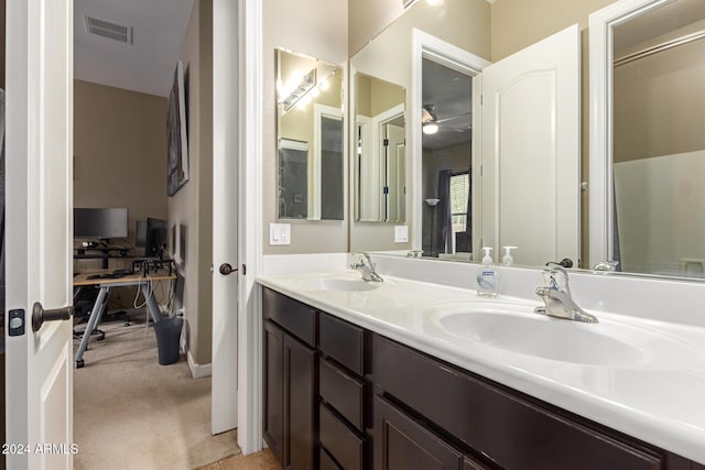 bathroom featuring vanity and ceiling fan