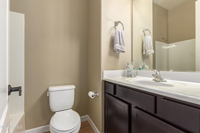 full bathroom featuring tile patterned flooring, vanity, bathtub / shower combination, and toilet