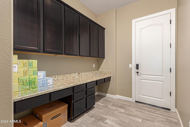 washroom with light hardwood / wood-style floors