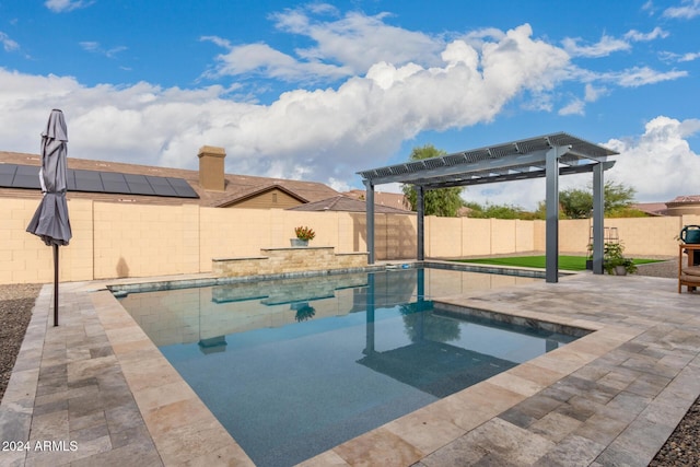 view of pool with a pergola and a patio