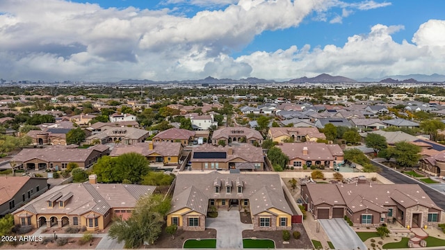 birds eye view of property featuring a mountain view