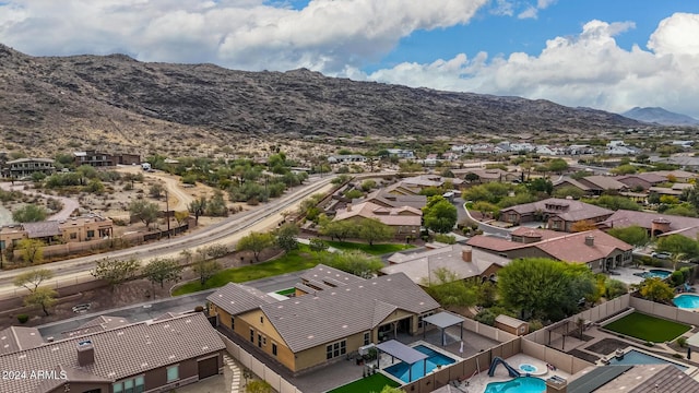 drone / aerial view featuring a mountain view