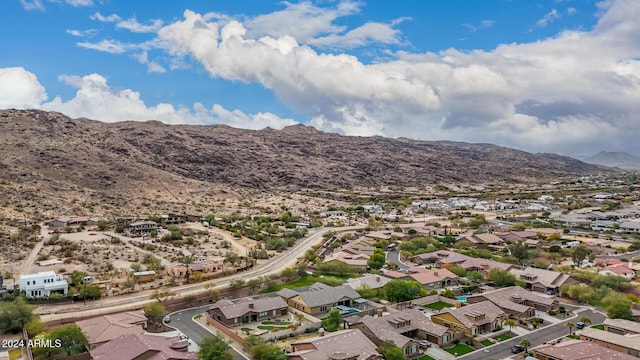 drone / aerial view featuring a mountain view