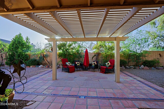 view of patio featuring a pergola