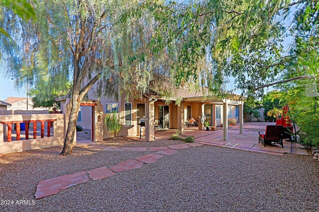 view of front of home with a patio