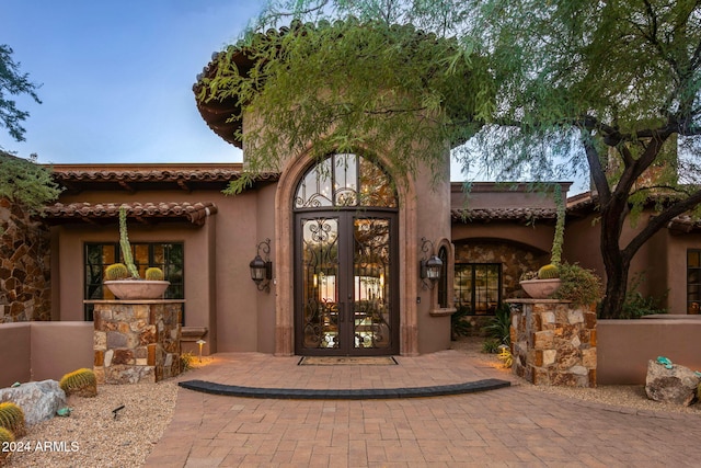 view of exterior entry with french doors