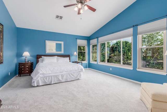 3713 E Encinas Ave, Gilbert, AZ 85234 - carpeted bedroom with vaulted ceiling, multiple windows, baseboards, and a ceiling fan