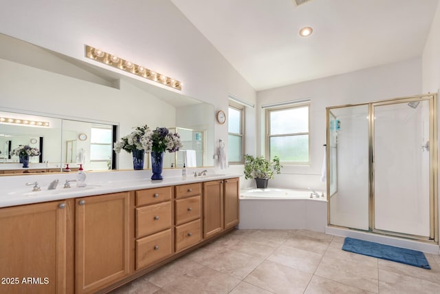 3713 E Encinas Ave, Gilbert, AZ 85234 - bathroom with vaulted ceiling, a stall shower, double vanity, a bath, and tile patterned floors