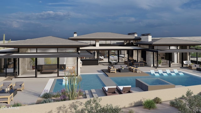 outdoor pool featuring an outdoor hangout area and a patio area