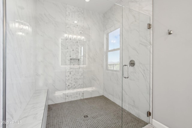 full bath with a marble finish shower