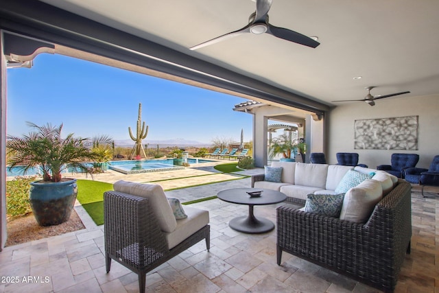 view of patio featuring an outdoor living space and an outdoor pool