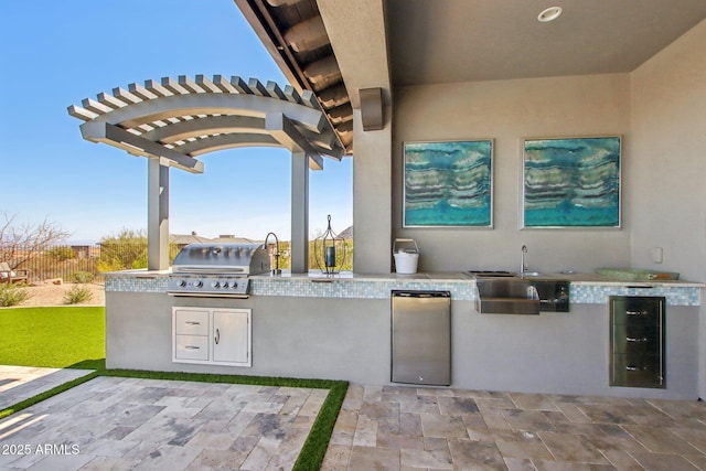 view of patio featuring fence, exterior kitchen, a pergola, wine cooler, and a grill