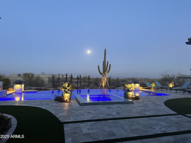 view of swimming pool featuring a fenced in pool, a patio, an in ground hot tub, and a fenced backyard