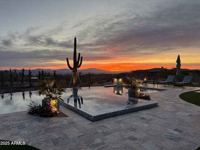 patio terrace at dusk with fence