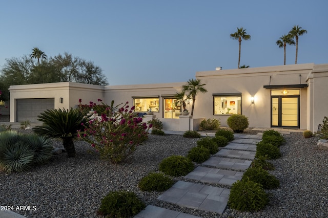 view of front of property featuring a garage