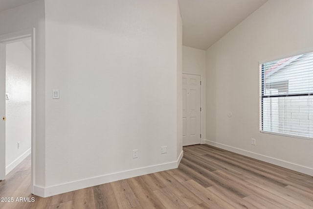 spare room featuring light hardwood / wood-style floors