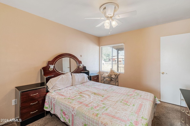 bedroom with ceiling fan and carpet floors