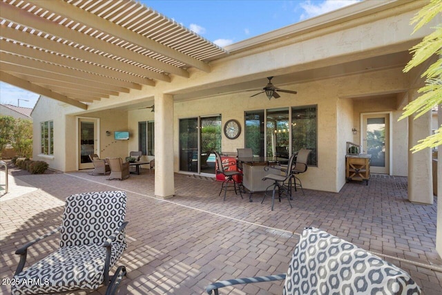 view of patio with a pergola and ceiling fan