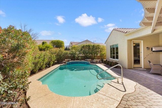 view of swimming pool featuring a patio