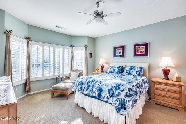 bedroom featuring ceiling fan and carpet floors