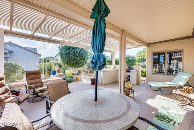 view of patio with exterior kitchen