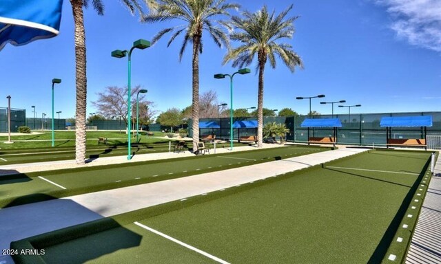 view of swimming pool with a patio and pool water feature