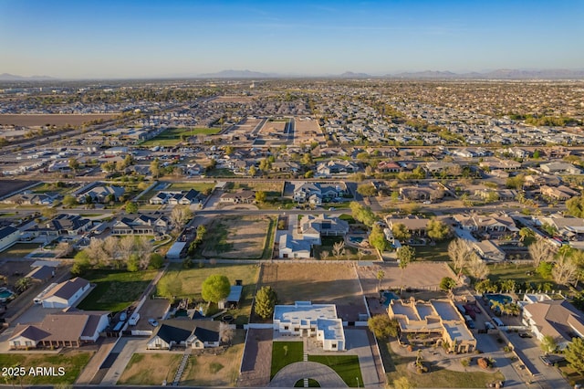 birds eye view of property with a residential view