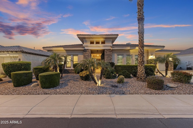 5122 S Miller Pl, Chandler, AZ 85249 - prairie-style home featuring stucco siding, a tile roof, and stone siding