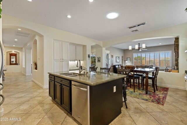 5122 S Miller Pl, Chandler, AZ 85249 - kitchen with visible vents, light stone countertops, dishwasher, and a sink