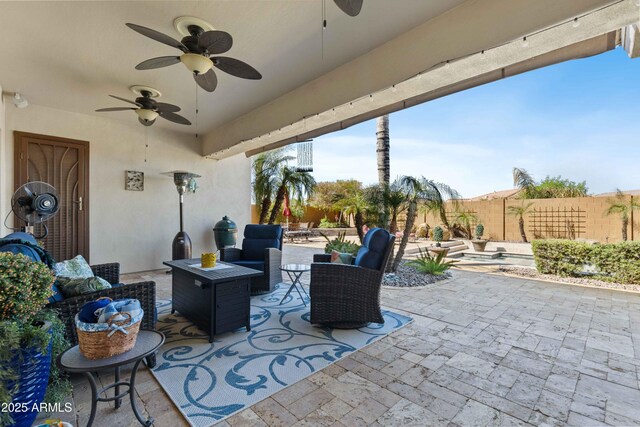 5122 S Miller Pl, Chandler, AZ 85249 - view of patio featuring outdoor lounge area, a fenced backyard, and a ceiling fan