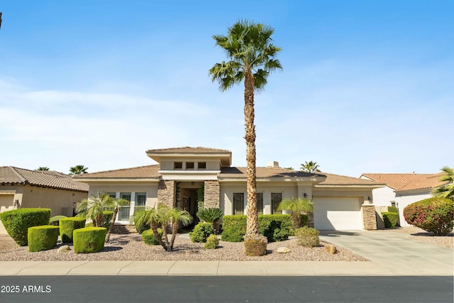 5122 S Miller Pl, Chandler, AZ 85249 - prairie-style house with concrete driveway, stucco siding, an attached garage, and stone siding