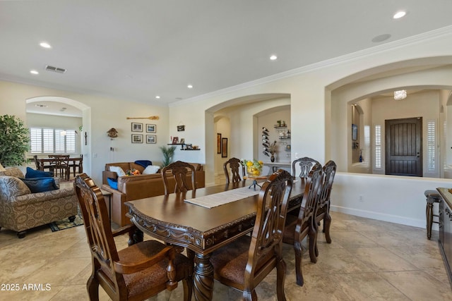 5122 S Miller Pl, Chandler, AZ 85249 - dining area with visible vents, crown molding, and arched walkways